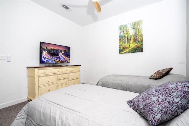 8919 Bismarck Palm Rd, Kissimmee, FL 34747 - carpeted bedroom with baseboards and ceiling fan