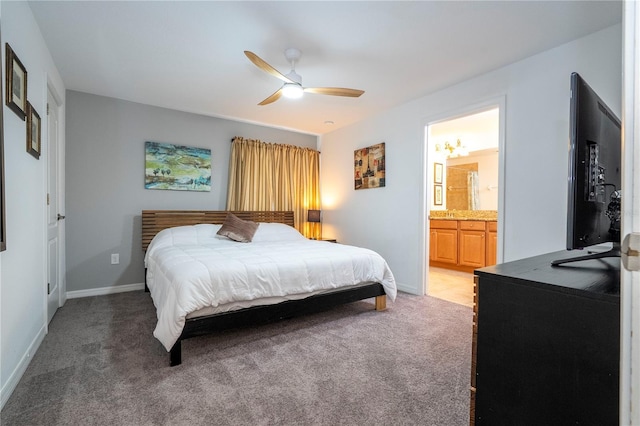 8919 Bismarck Palm Rd, Kissimmee, FL 34747 - bedroom featuring light colored carpet, connected bathroom, a ceiling fan, and baseboards