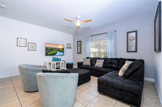 8919 Bismarck Palm Rd, Kissimmee, FL 34747 - living room with light tile patterned floors, a ceiling fan, and baseboards
