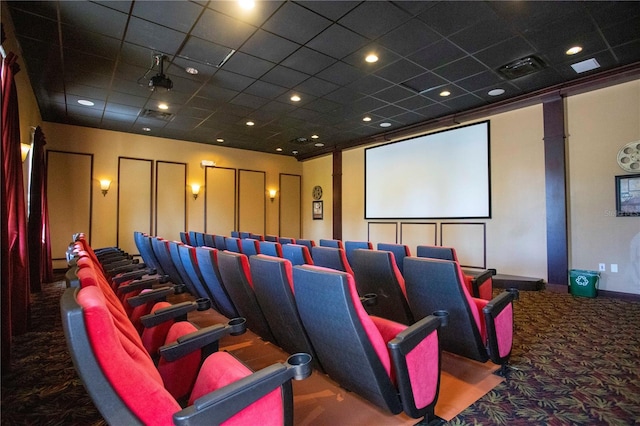 8919 Bismarck Palm Rd, Kissimmee, FL 34747 - carpeted home theater room featuring a paneled ceiling