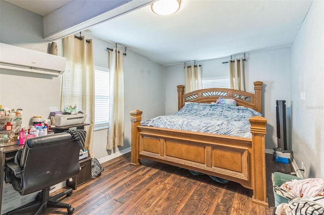 bedroom with dark wood-style flooring and baseboards