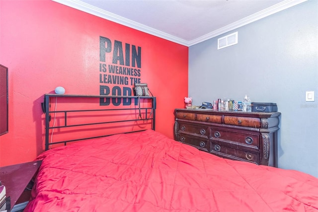bedroom with crown molding