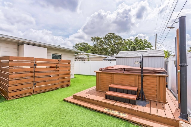 deck featuring a hot tub