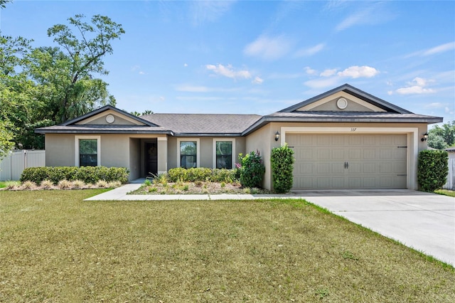 337 Southern Winds Blvd, Deland, FL 32720 - ranch-style house featuring stucco siding, concrete driveway, and an attached garage