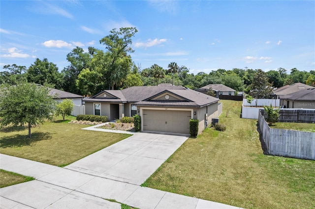 337 Southern Winds Blvd, Deland, FL 32720 - ranch-style house with an attached garage, concrete driveway, and stucco siding