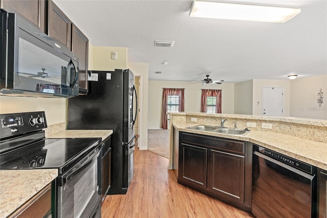 337 Southern Winds Blvd, Deland, FL 32720 - kitchen featuring black appliances, ceiling fan, a sink, light wood-style floors, and light countertops