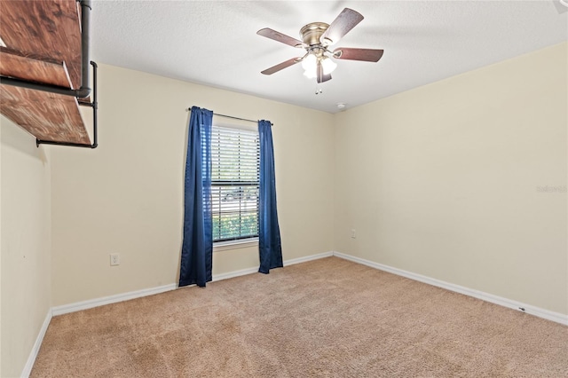 337 Southern Winds Blvd, Deland, FL 32720 - unfurnished room featuring light carpet, a ceiling fan, baseboards, and a textured ceiling