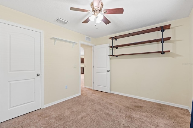337 Southern Winds Blvd, Deland, FL 32720 - unfurnished bedroom with light carpet, baseboards, and ceiling fan
