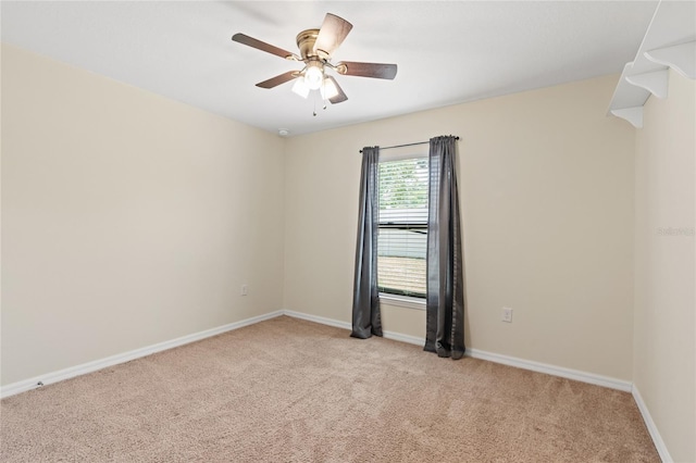 337 Southern Winds Blvd, Deland, FL 32720 - empty room featuring light carpet, baseboards, and a ceiling fan