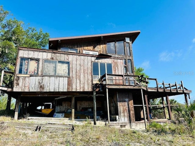 505 Lakeview Ave, Titusville, FL 32796 - rear view of property with a deck