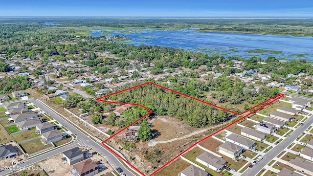 505 Lakeview Ave, Titusville, FL 32796 - aerial view of residential area featuring property parcel outlined and a large body of water