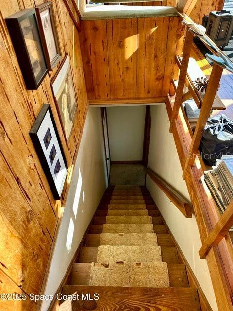 505 Lakeview Ave, Titusville, FL 32796 - stairway with wood finished floors and baseboards
