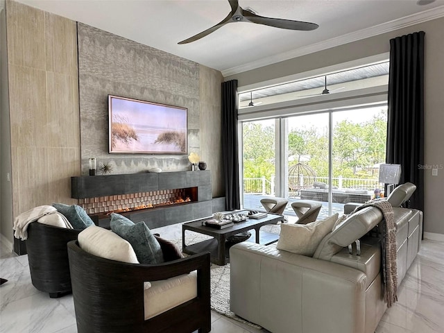 living room featuring crown molding, a ceiling fan, a fireplace, and marble finish flooring