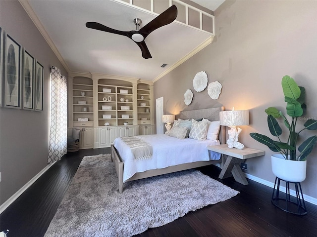 bedroom featuring crown molding, baseboards, dark wood finished floors, and a ceiling fan