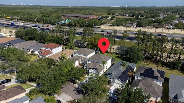 5007 Bellthorn Dr, Orlando, FL 32837 - aerial overview of property's location featuring nearby suburban area