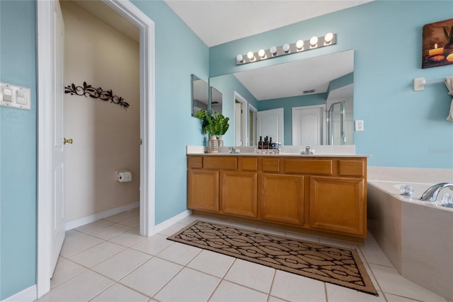 5007 Bellthorn Dr, Orlando, FL 32837 - full bathroom with tile patterned flooring, a shower stall, a garden tub, and double vanity