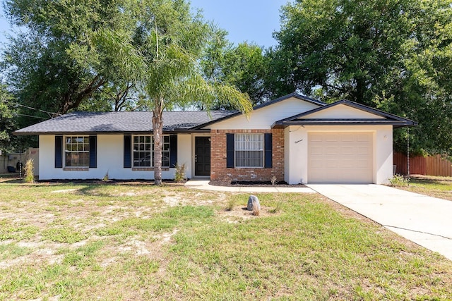 18 Palmira Rd, Debary, FL 32713 - ranch-style house with an attached garage, driveway, and stucco siding