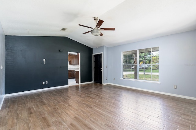 18 Palmira Rd, Debary, FL 32713 - unfurnished room featuring a ceiling fan, wood finished floors, lofted ceiling, and baseboards