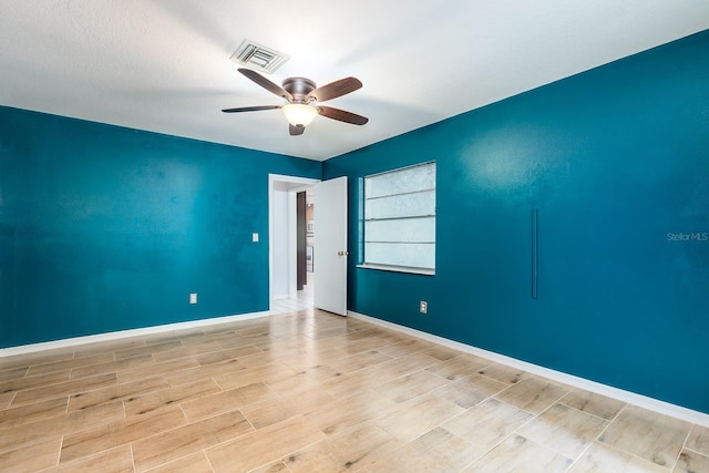 18 Palmira Rd, Debary, FL 32713 - unfurnished room featuring a ceiling fan, wood finished floors, and baseboards