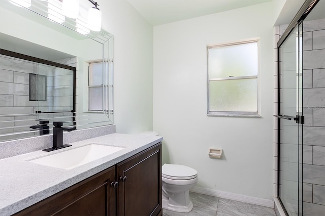 18 Palmira Rd, Debary, FL 32713 - full bathroom featuring toilet, vanity, tiled shower, and baseboards
