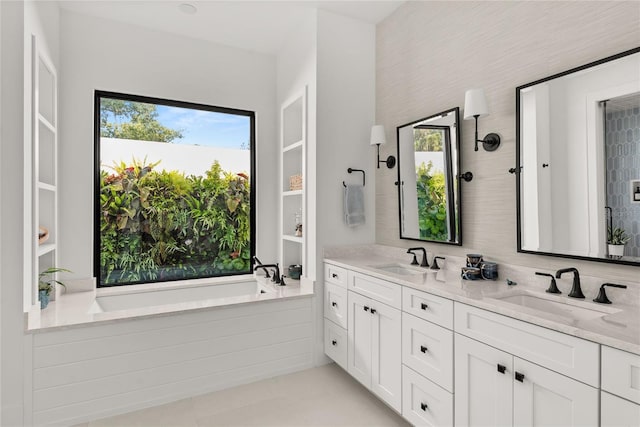 full bath featuring double vanity and a garden tub