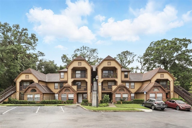 485 Forestway Cir Unit 108, Altamonte Springs, FL 32701 - view of property featuring uncovered parking