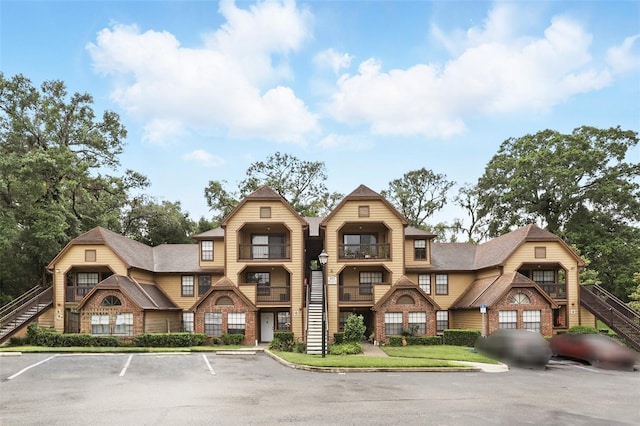 485 Forestway Cir Unit 108, Altamonte Springs, FL 32701 - view of building exterior with uncovered parking