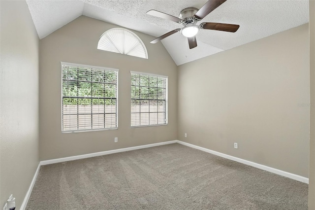 485 Forestway Cir Unit 108, Altamonte Springs, FL 32701 - spare room with lofted ceiling, healthy amount of natural light, ceiling fan, carpet, and a textured ceiling