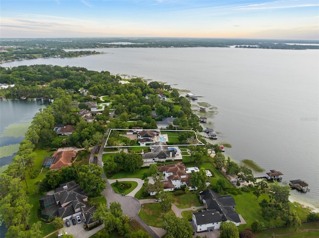 1455 Kelso Blvd, Windermere, FL 34786 - aerial perspective of suburban area featuring a large body of water and property boundaries highlighted