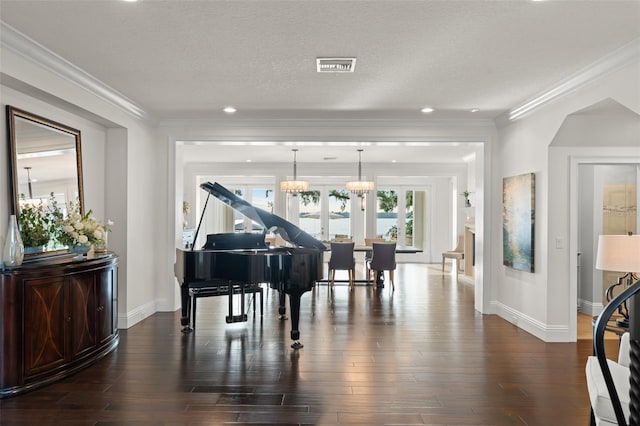 1455 Kelso Blvd, Windermere, FL 34786 - living area with baseboards, ornamental molding, dark wood finished floors, recessed lighting, and a textured ceiling