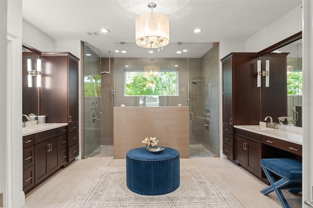 1455 Kelso Blvd, Windermere, FL 34786 - bathroom with a stall shower, vanity, tile patterned floors, and recessed lighting