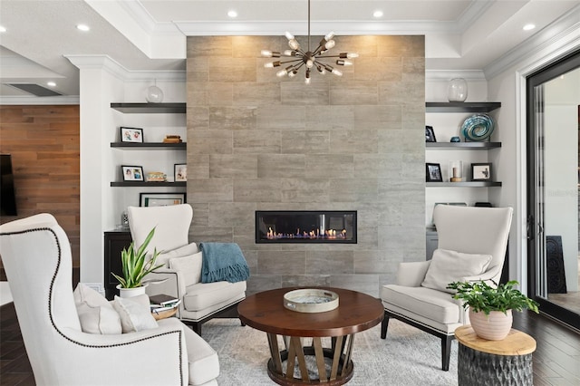 1455 Kelso Blvd, Windermere, FL 34786 - living room featuring crown molding, built in shelves, a chandelier, wood finished floors, and recessed lighting