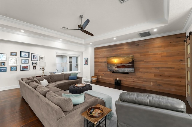 1455 Kelso Blvd, Windermere, FL 34786 - living room with a ceiling fan, recessed lighting, wood walls, dark wood-style floors, and baseboards