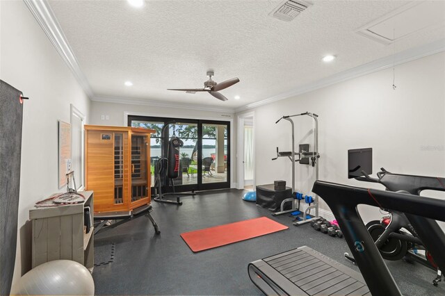 1455 Kelso Blvd, Windermere, FL 34786 - exercise area featuring attic access, a ceiling fan, recessed lighting, a textured ceiling, and crown molding