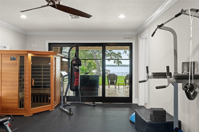 1455 Kelso Blvd, Windermere, FL 34786 - workout room featuring a textured ceiling, a water view, ceiling fan, recessed lighting, and ornamental molding