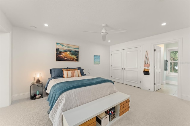 1455 Kelso Blvd, Windermere, FL 34786 - bedroom with light carpet, recessed lighting, a closet, baseboards, and a ceiling fan