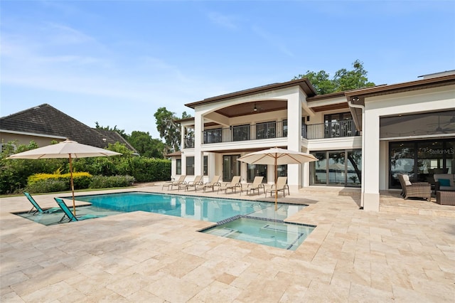 1455 Kelso Blvd, Windermere, FL 34786 - view of swimming pool featuring a patio area and a pool with connected hot tub