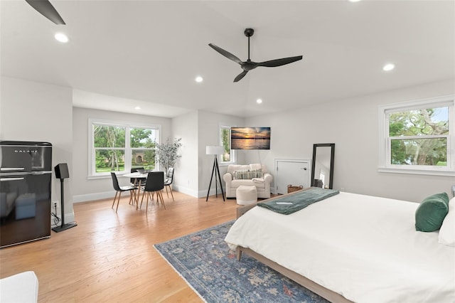 1455 Kelso Blvd, Windermere, FL 34786 - bedroom featuring fridge, light wood finished floors, recessed lighting, and baseboards