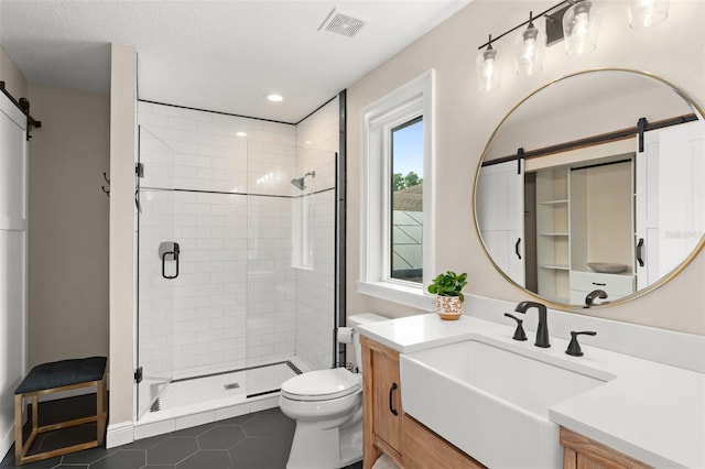 1455 Kelso Blvd, Windermere, FL 34786 - full bath with vanity, a shower stall, toilet, tile patterned flooring, and recessed lighting