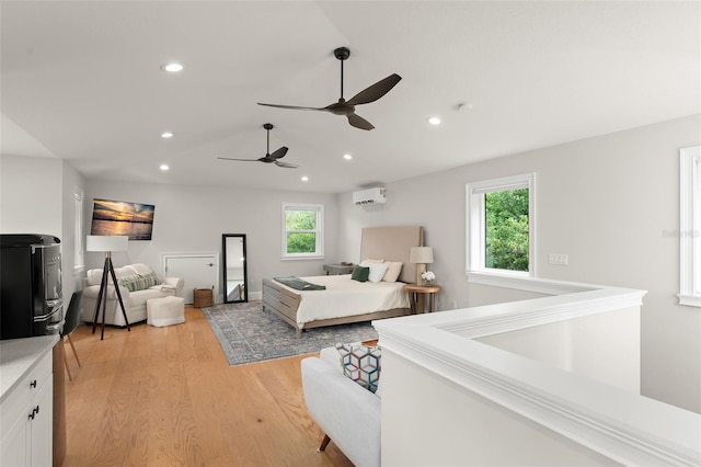 1455 Kelso Blvd, Windermere, FL 34786 - bedroom featuring light wood-type flooring, recessed lighting, a wall unit AC, and a ceiling fan