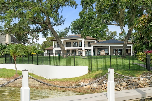 1455 Kelso Blvd, Windermere, FL 34786 - back of property with solar panels and a balcony