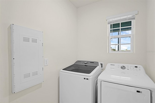 laundry room featuring independent washer and dryer