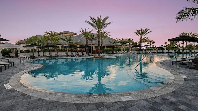 5658 Nevis Ter, Kissimmee, FL 34758 - community pool with a patio area and fence