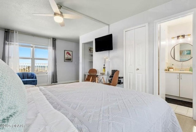 935 S Atlantic Ave Unit 355, Daytona Beach, FL 32118 - bedroom featuring a closet, connected bathroom, and ceiling fan