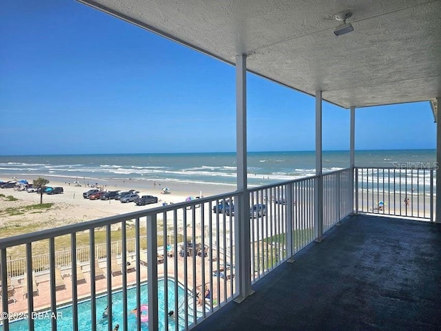 935 S Atlantic Ave Unit 355, Daytona Beach, FL 32118 - balcony featuring view of water and beach and view of pool area