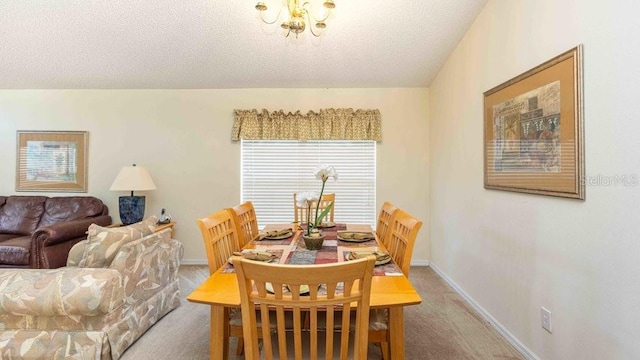 2805 Lido Key Ct, Kissimmee, FL 34747 - dining room featuring baseboards, carpet flooring, and a textured ceiling