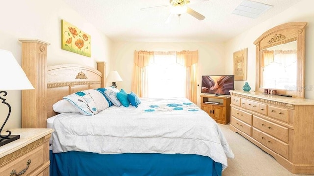 2805 Lido Key Ct, Kissimmee, FL 34747 - bedroom featuring multiple windows, light carpet, and ceiling fan