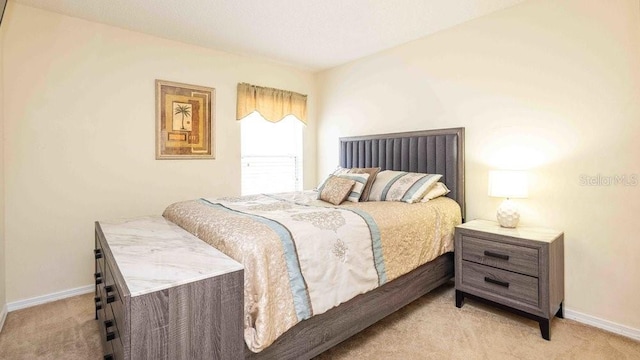 2805 Lido Key Ct, Kissimmee, FL 34747 - bedroom featuring light carpet and baseboards