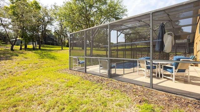 2805 Lido Key Ct, Kissimmee, FL 34747 - view of home's community with a patio area and a lawn
