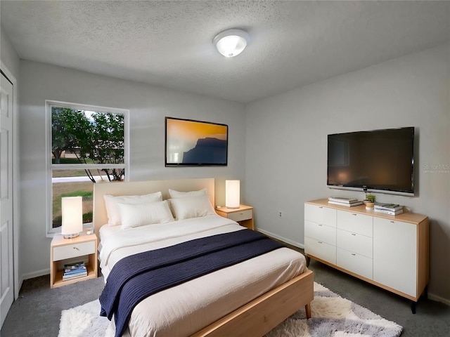3090 Yorkshire Dr, Deltona, FL 32738 - bedroom featuring carpet flooring, baseboards, and a textured ceiling